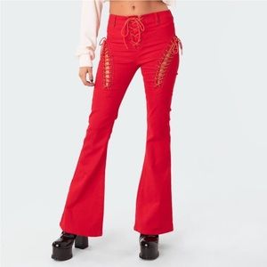 Edikted “Engine Red Flared Jeans”